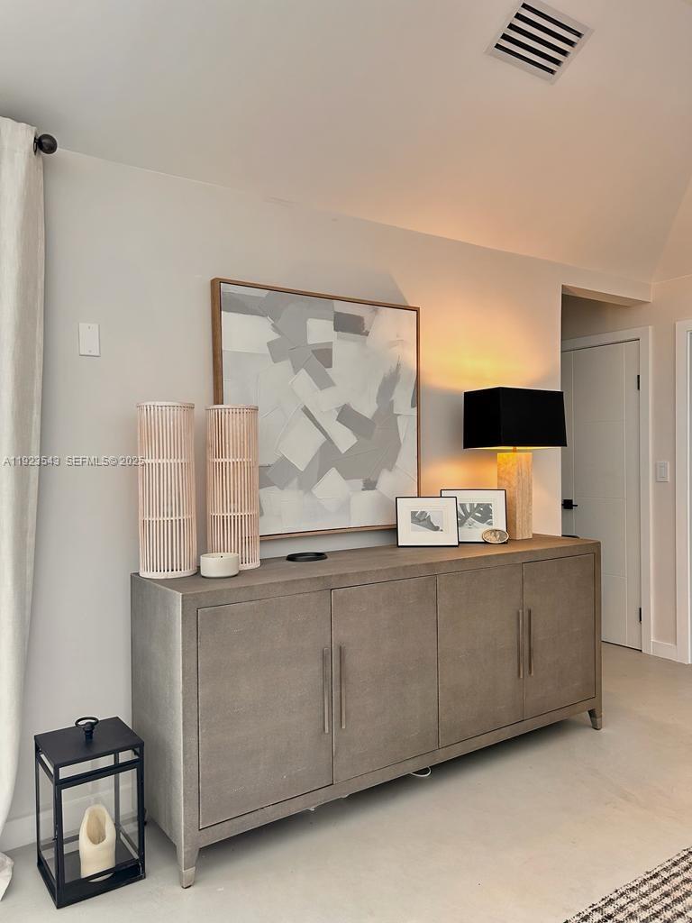 375 Harbor Court Key Biscayne, FL 33149 - Photo 24 of 58 a living room with furniture and painting on the wall