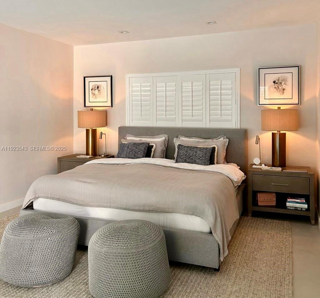 375 Harbor Court Key Biscayne, FL 33149 - Photo 28 of 58 a bedroom with a bed and window