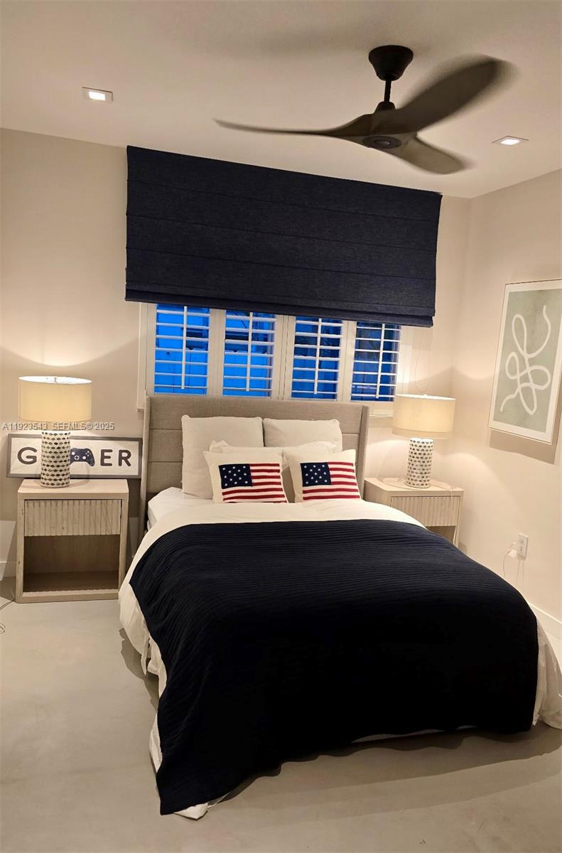 375 Harbor Court Key Biscayne, FL 33149 - Photo 40 of 58 a bedroom with a bed and a view of kitchen