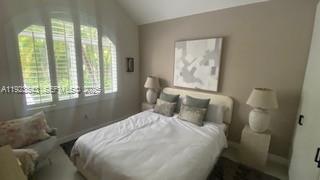 375 Harbor Court Key Biscayne, FL 33149 - Photo 41 of 58 a bedroom with a bed and a large window