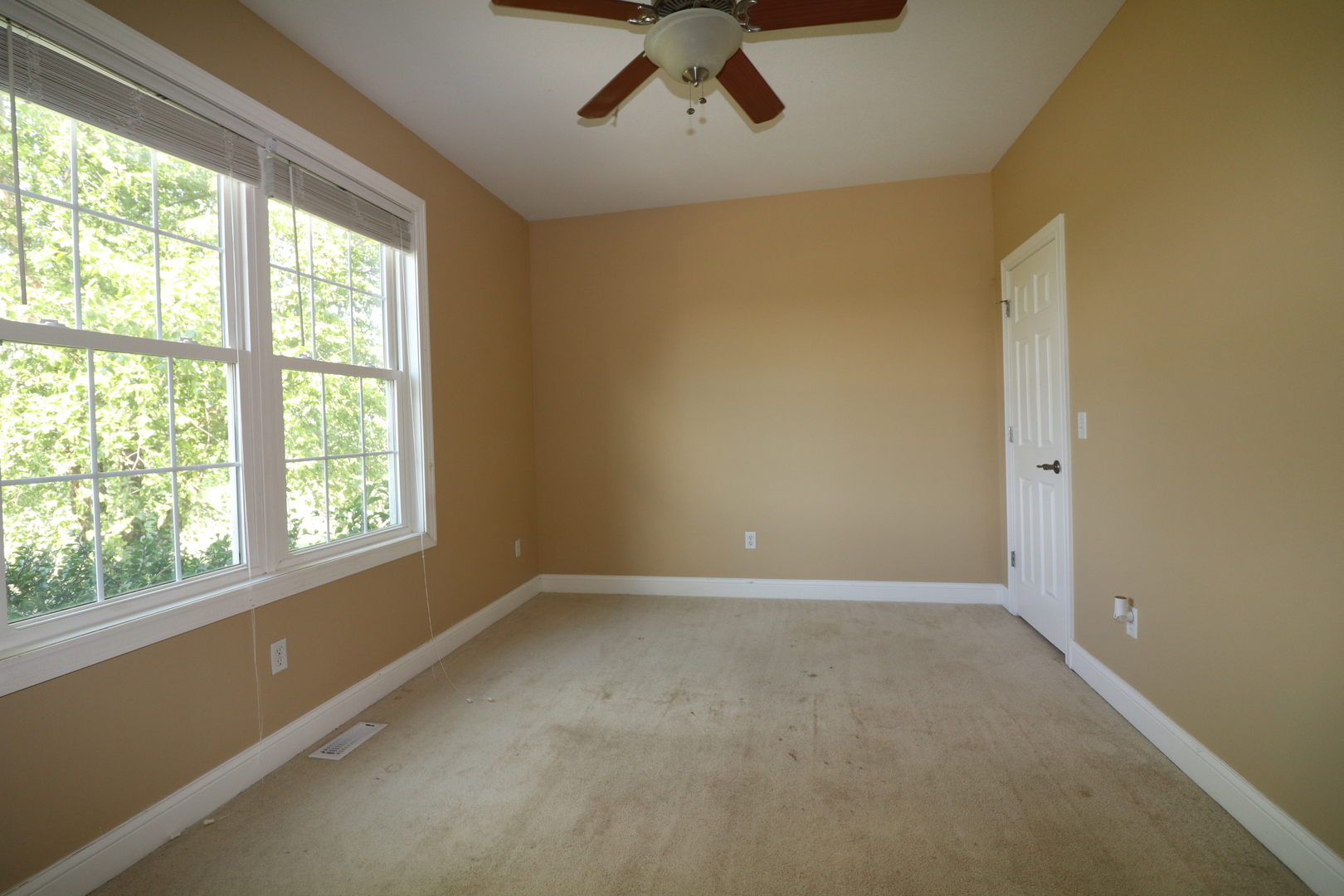 9358 Little Galilee Road Clinton, IL 61727 - Photo 11 of 40 an empty room with a window