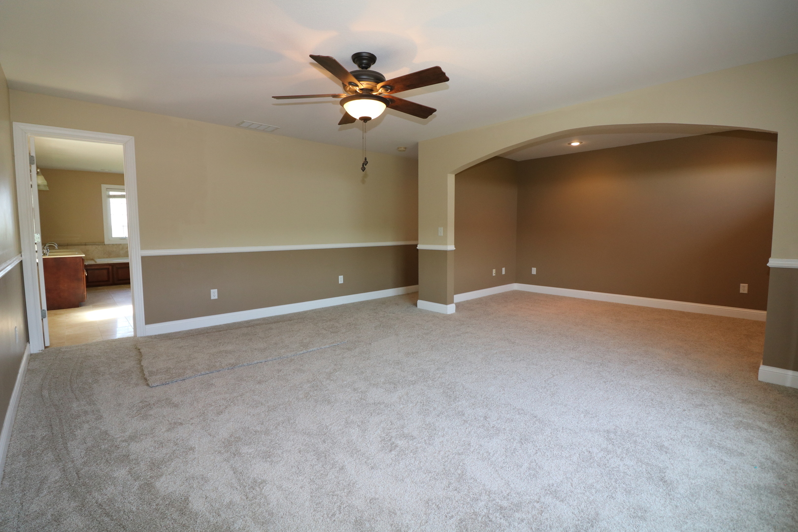9358 Little Galilee Road Clinton, IL 61727 - Photo 27 of 40 an empty room with closet and fan