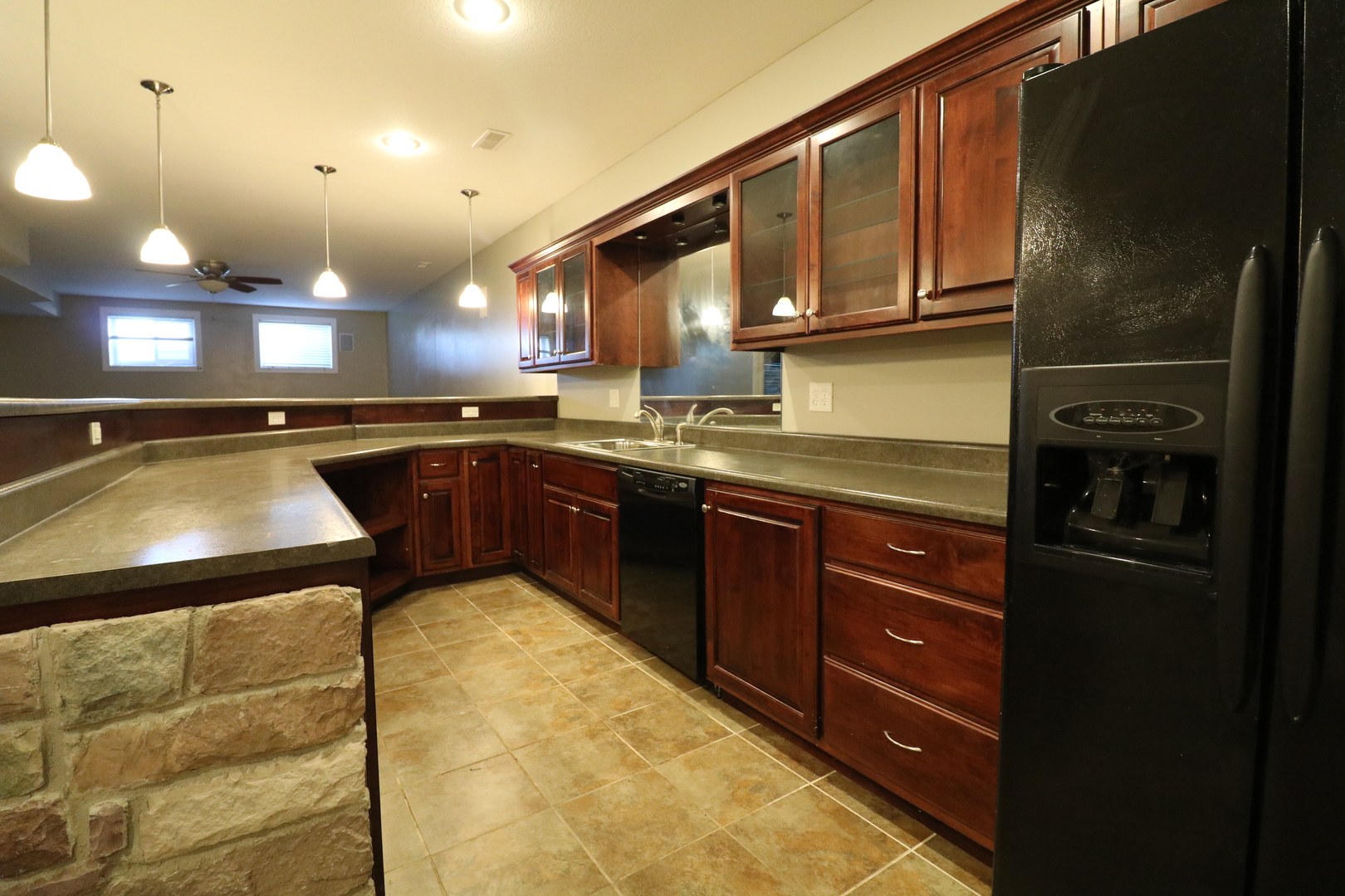9358 Little Galilee Road Clinton, IL 61727 - Photo 32 of 40 a kitchen with a sink a stove and cabinets