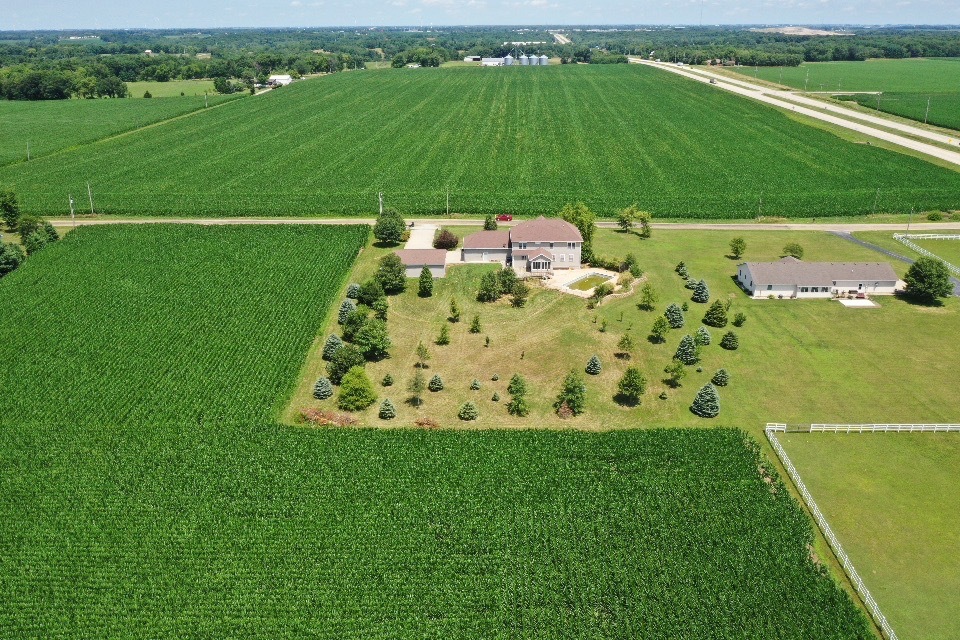 9358 Little Galilee Road Clinton, IL 61727 - Photo 39 of 40 a view of a golf course with a lake view