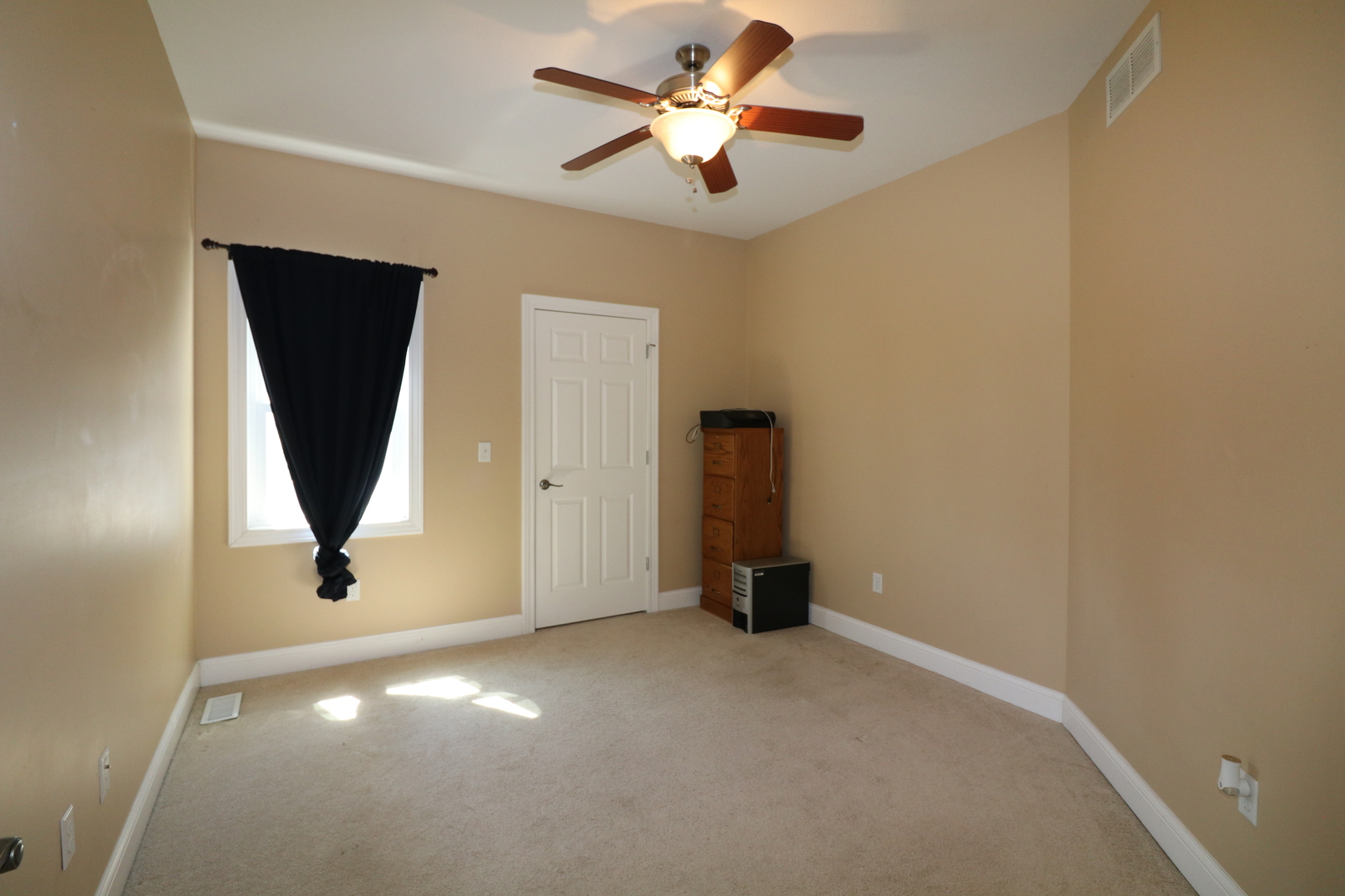9358 Little Galilee Road Clinton, IL 61727 - Photo 9 of 40 a view of a room with a ceiling fan