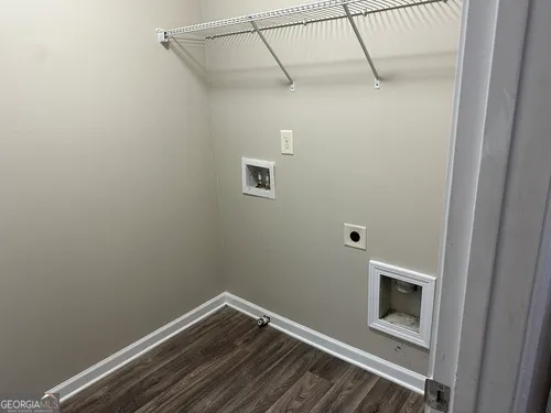 a view of a room with rack on the wall