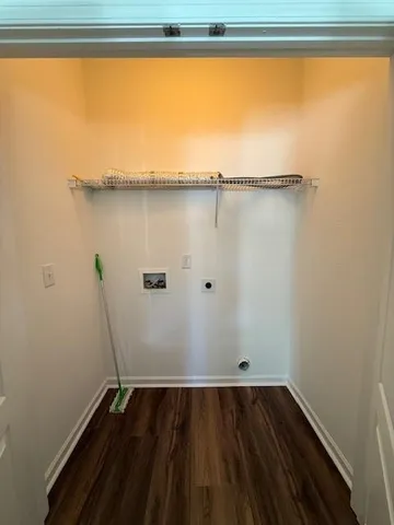 a view of a room with rack on the wall