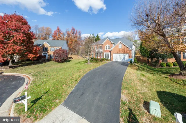 a view of a backyard of the house