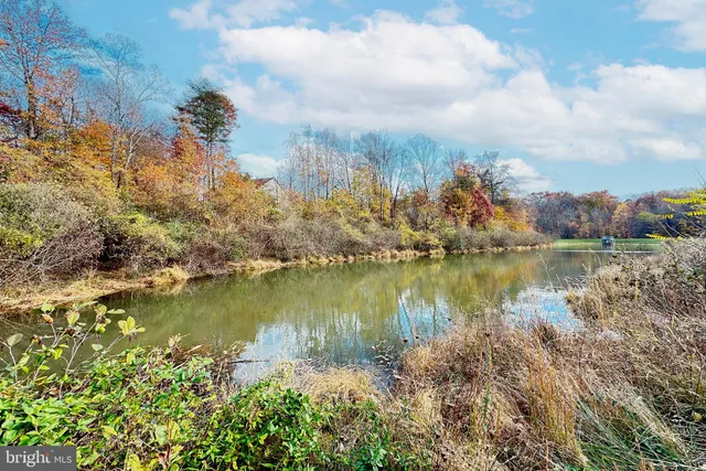 view of living room with furniture and a table