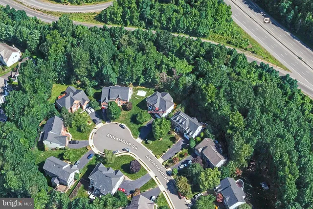 a view of a lake with houses in the back