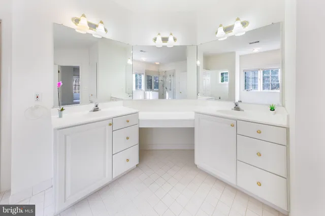 a view of an entryway with wooden floor and windows