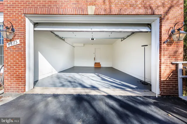 a view of a brick building with many windows