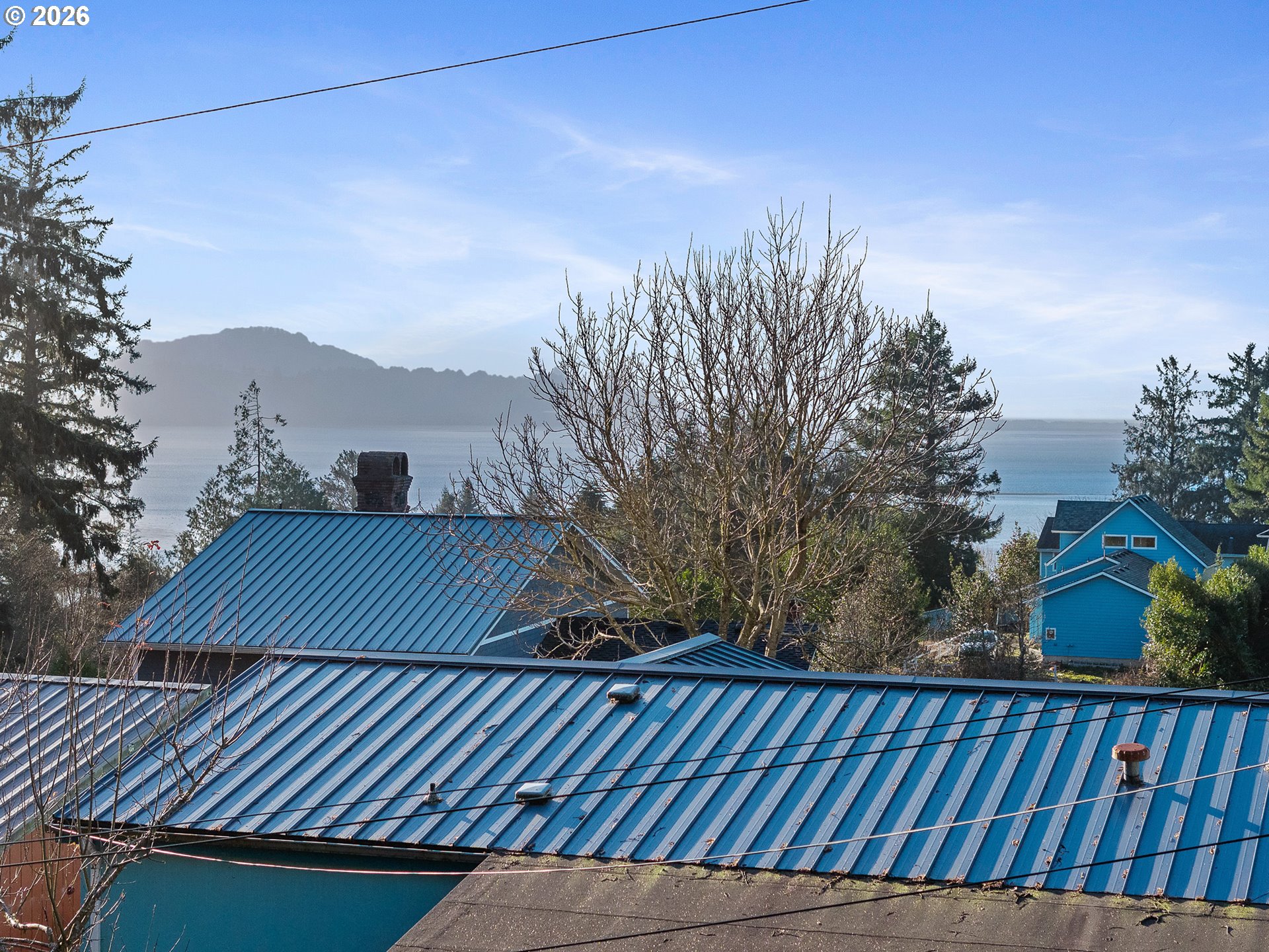 1102 12th Street Bay City, OR 97107 - Photo 3 of 13 a view of a backyard