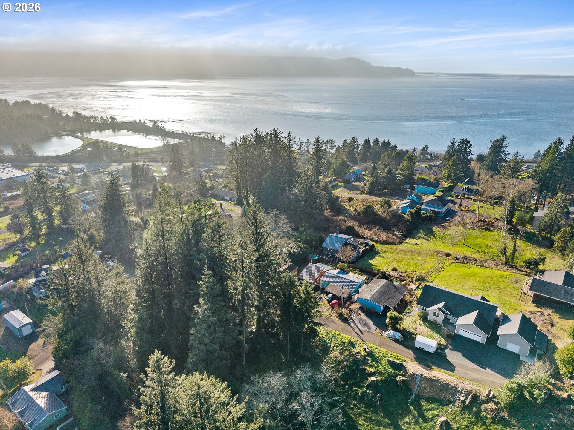 1102 12th Street Bay City, OR 97107 - Photo 7 of 13 a view of a city with ocean view