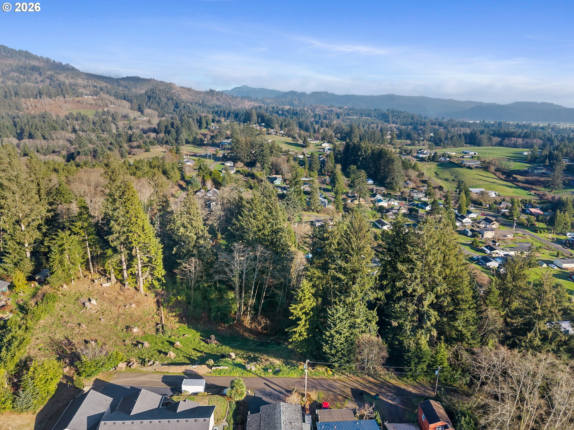 1102 12th Street Bay City, OR 97107 - Photo 10 of 13 an aerial view of residential house with outdoor space