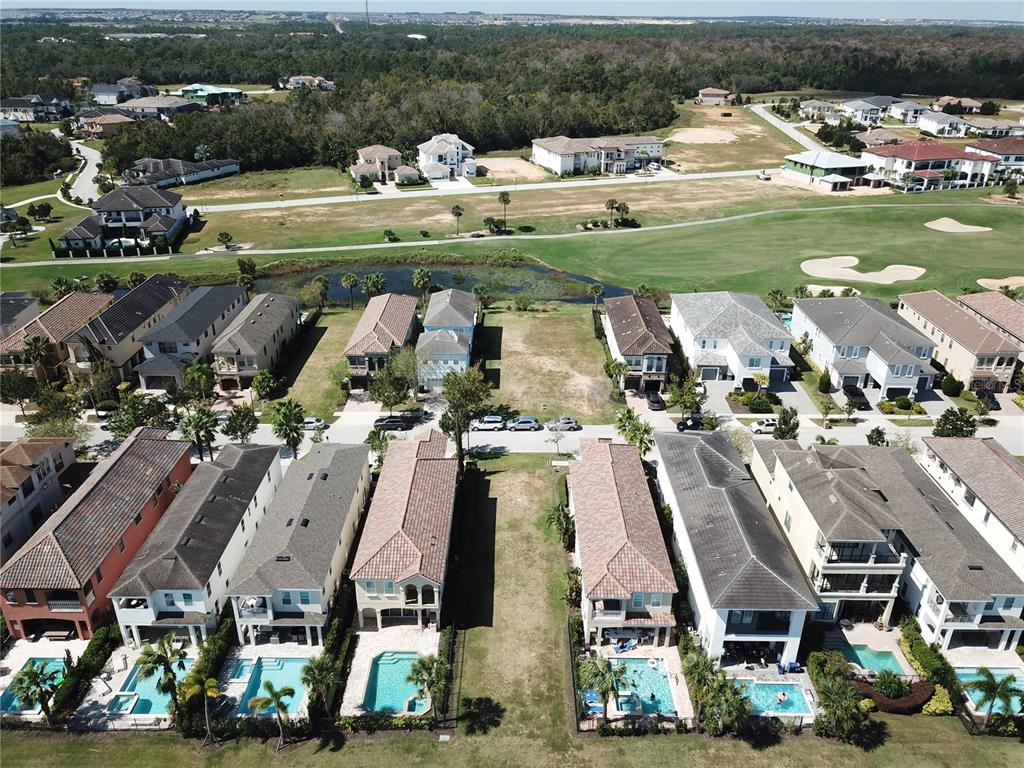 1149 Castle Pines Court Reunion, FL 34747 - Photo 6 of 16 a view of a lake with a city