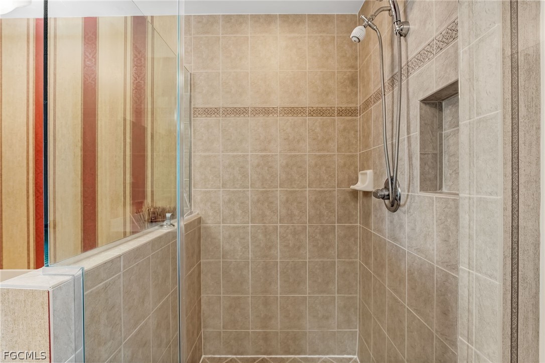 2743 First Street, Unit 2102 Fort Myers, FL 33916 - Photo 23 of 42 a bathroom with a shower