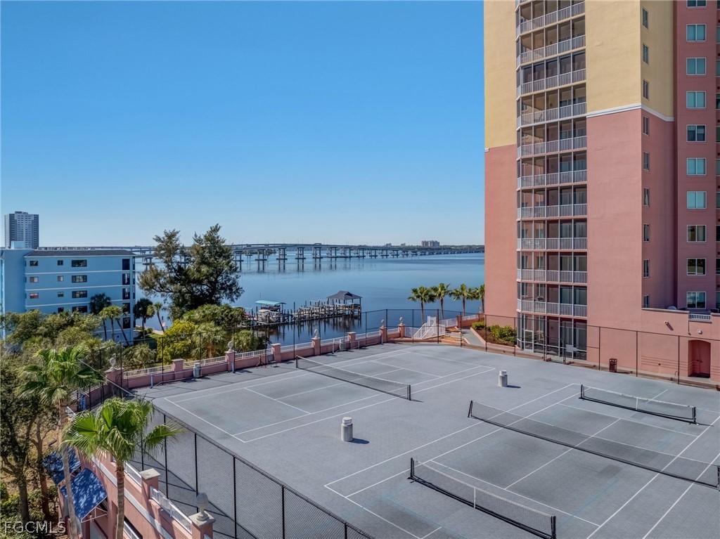 2743 First Street, Unit 2102 Fort Myers, FL 33916 - Photo 41 of 42 a terrace with outdoor seating and city view