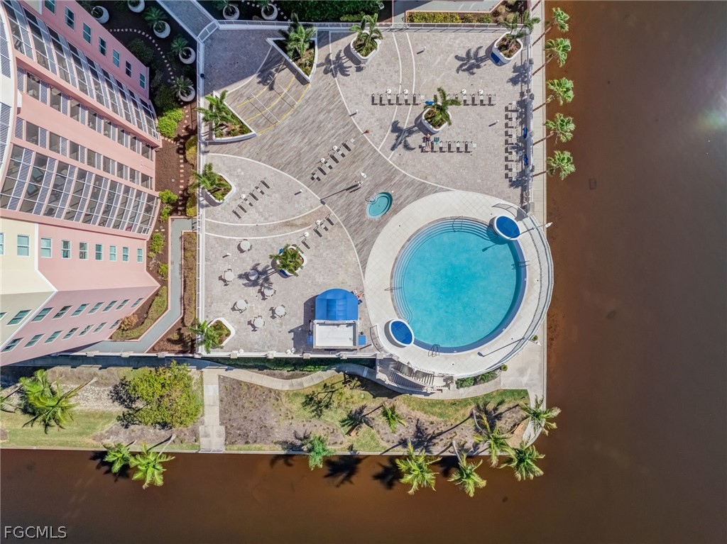 2743 First Street, Unit 2102 Fort Myers, FL 33916 - Photo 5 of 42 an aerial view of a house with a swimming pool