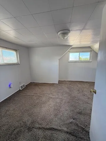a view of a room with an empty space
