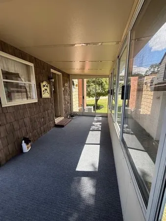 a view of a building from the hallway