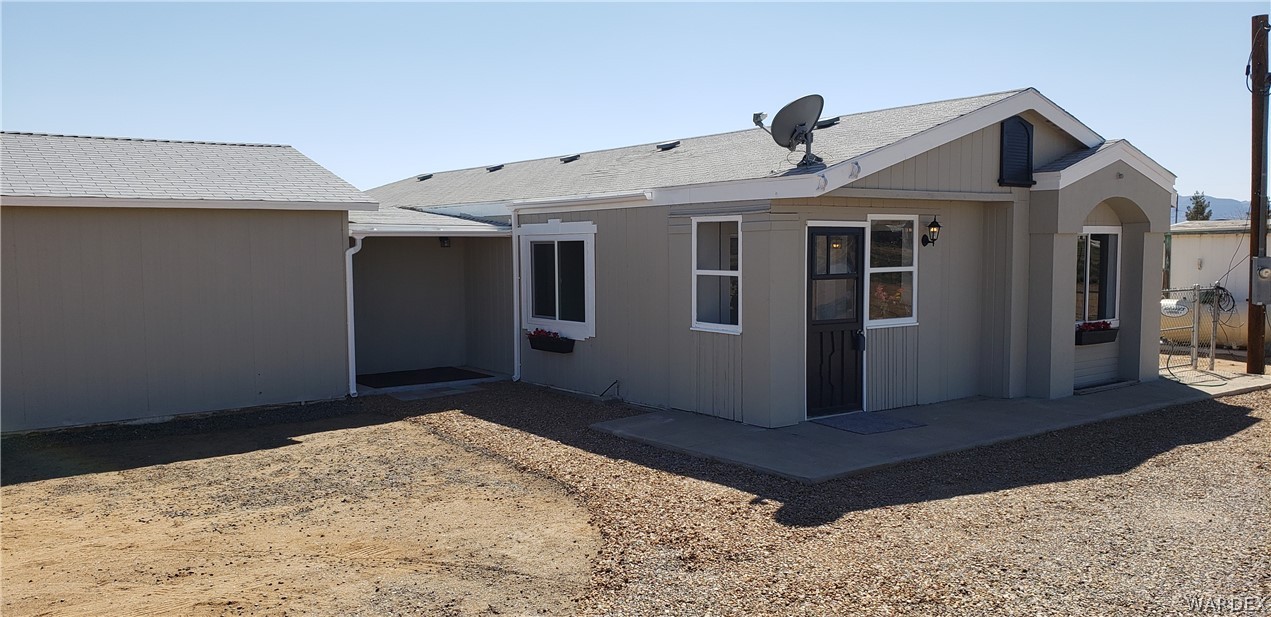 897 South Verde Road Golden Valley, AZ 86413 - Photo 2 of 49 Front of home