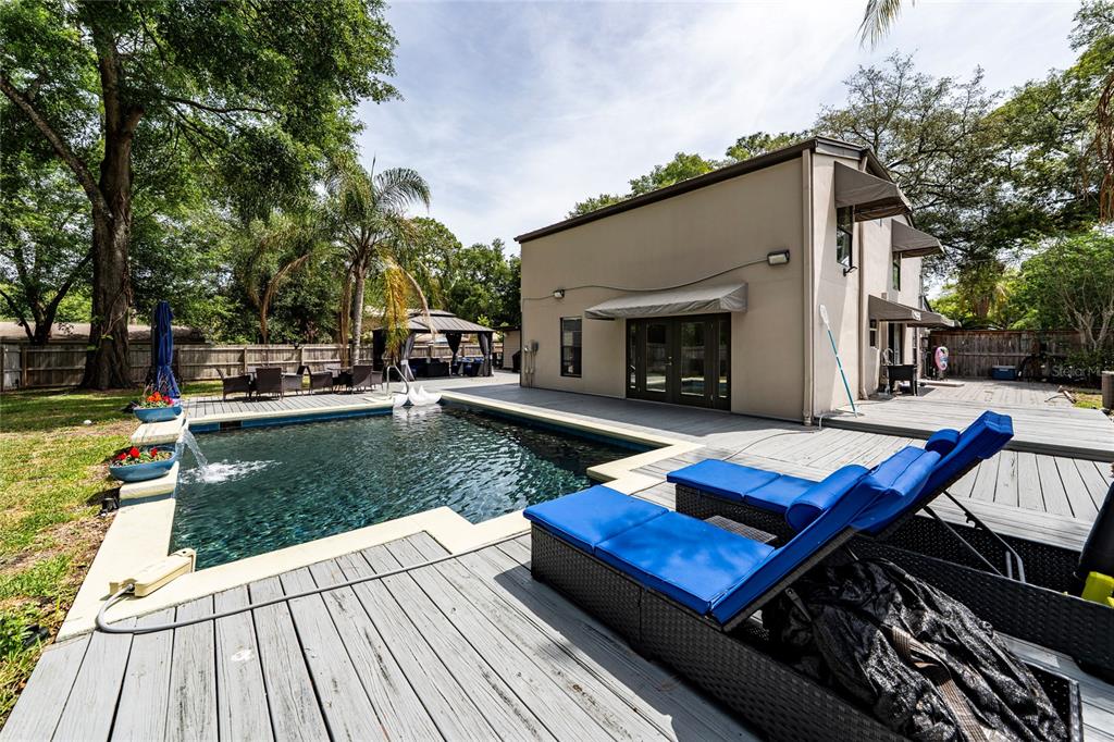 357 Ridgewood Street Altamonte Springs, FL 32701 - Photo 26 of 36 a view of a backyard with sitting area