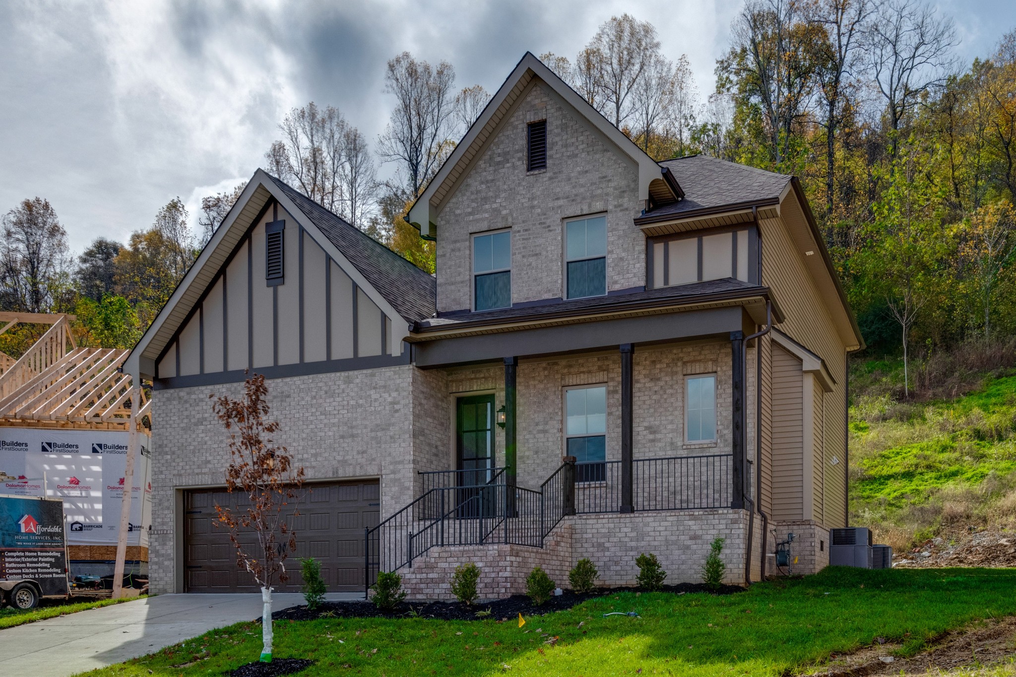 18 Hon Circle Murfreesboro, TN 37128 - Photo 2 of 30 a front view of a house with a garden and plants