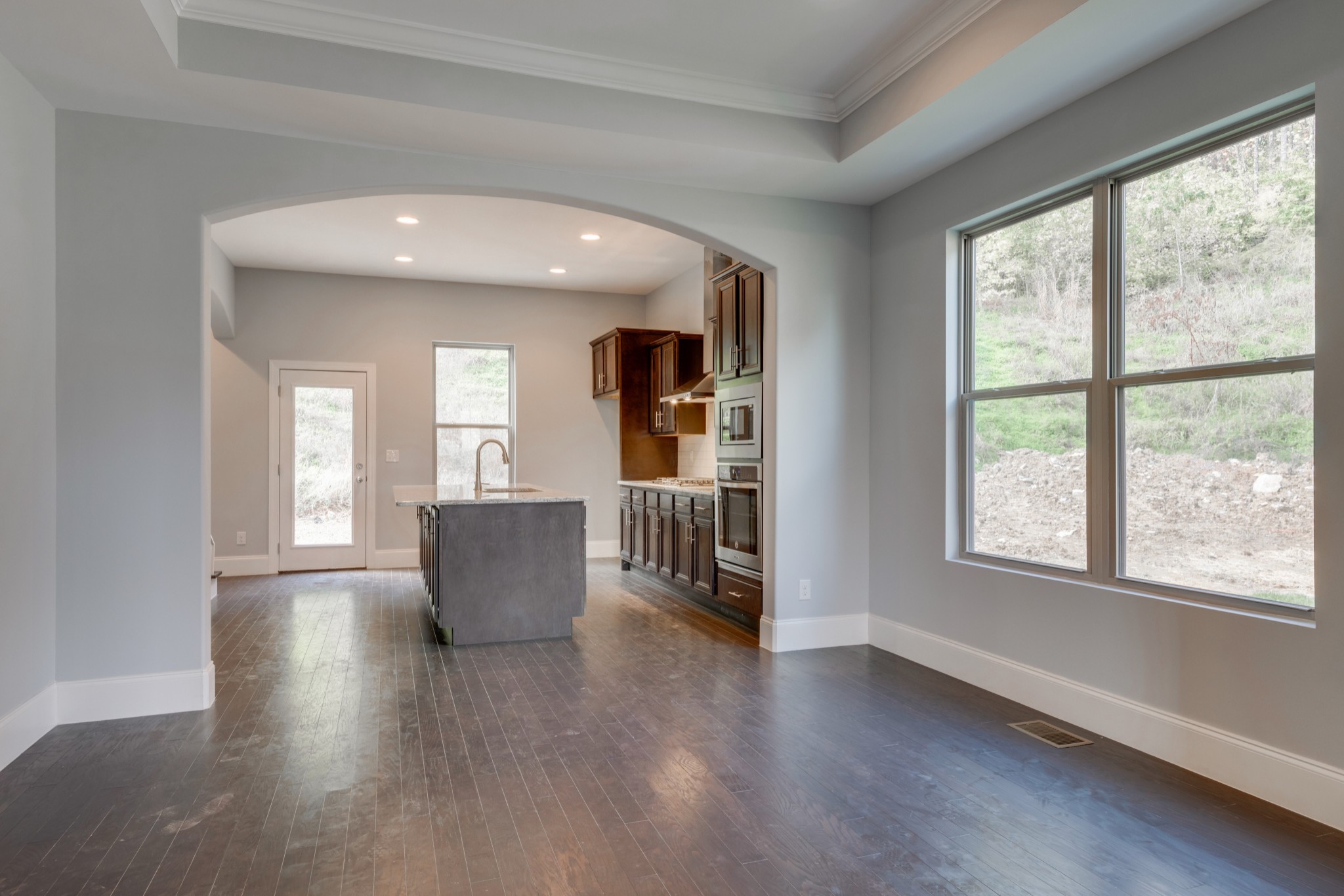 18 Hon Circle Murfreesboro, TN 37128 - Photo 8 of 30 wooden floor in an empty room with a window