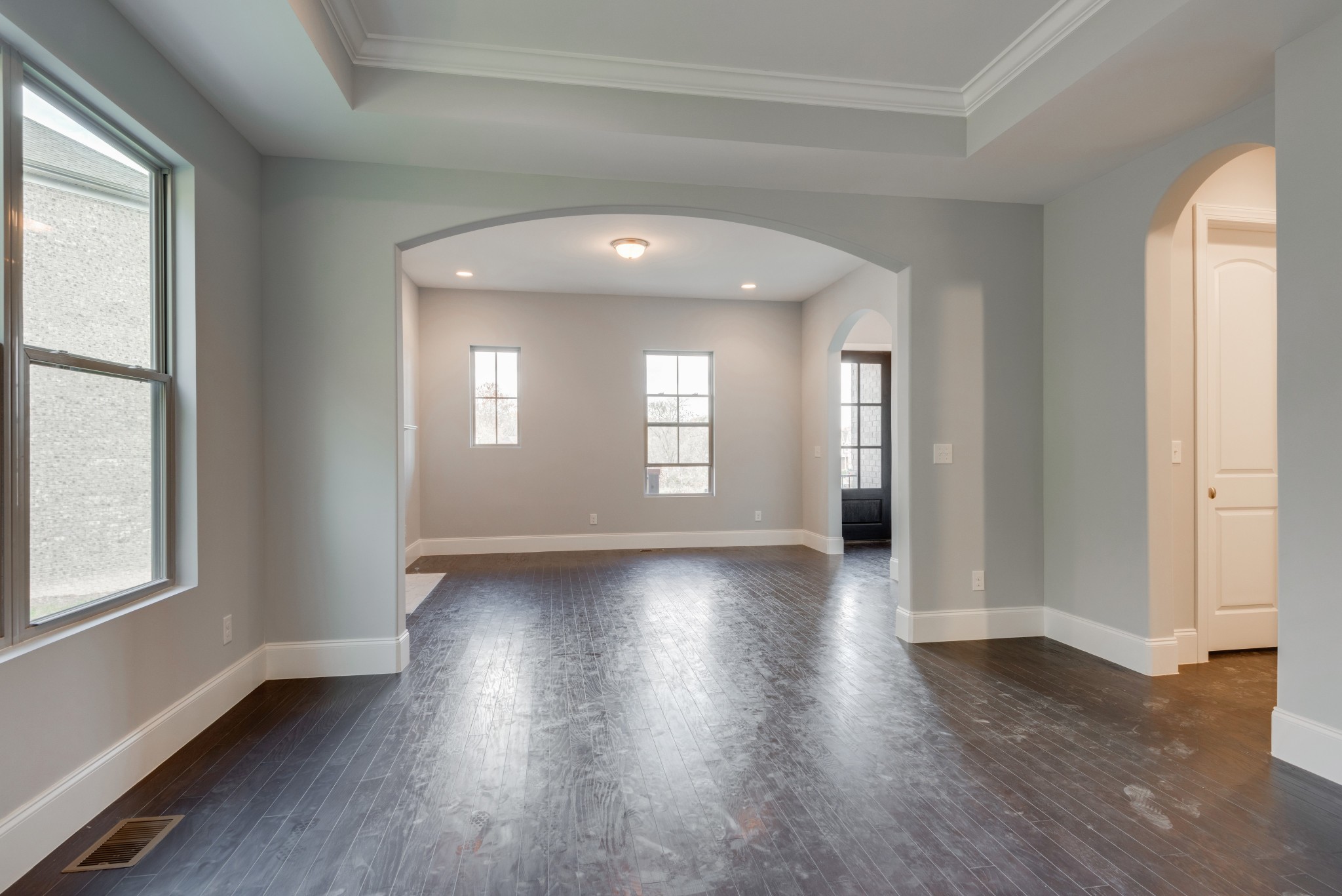 18 Hon Circle Murfreesboro, TN 37128 - Photo 9 of 30 an empty room with wooden floor and windows