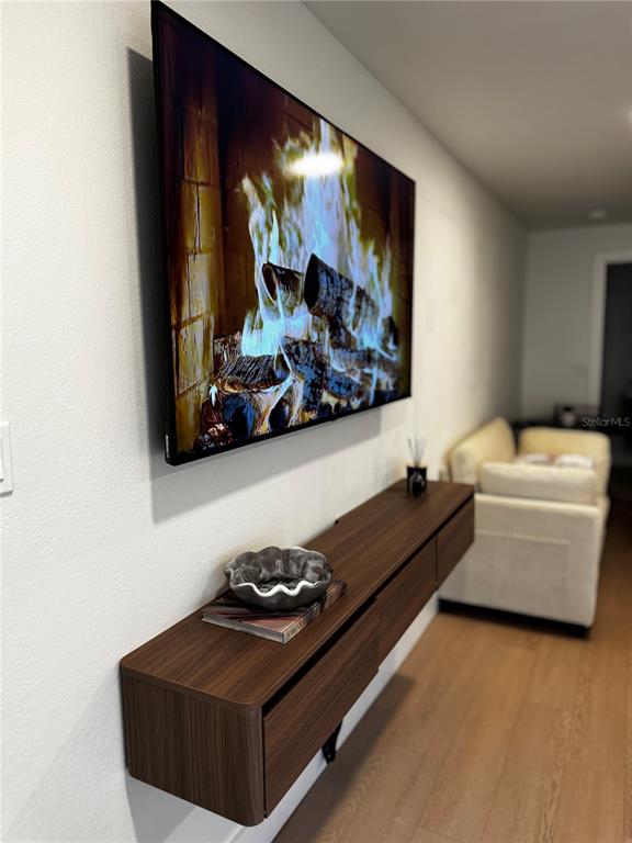 43420 Highway 27, Unit 414 Davenport, FL 33837 - Photo 15 of 41 a living room with furniture and a flat screen tv