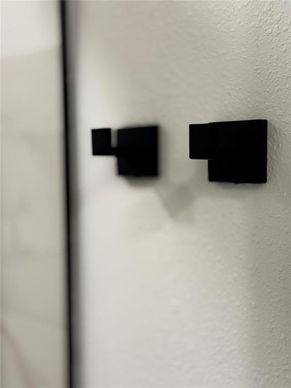 43420 Highway 27, Unit 414 Davenport, FL 33837 - Photo 22 of 41 a view of an empty room with wooden floor