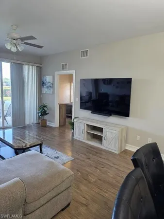 a view of a swimming pool with a garden