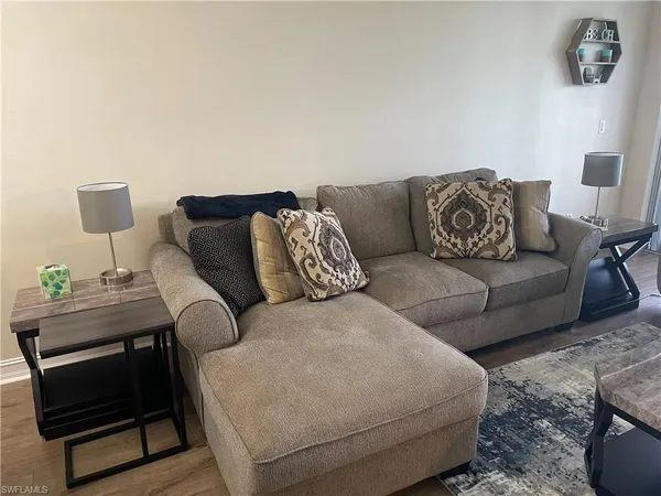 a living room with furniture and a couch
