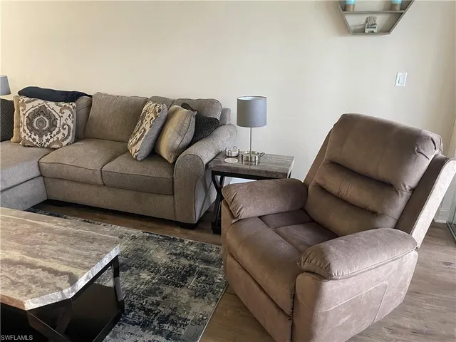 a living room with furniture and a couch