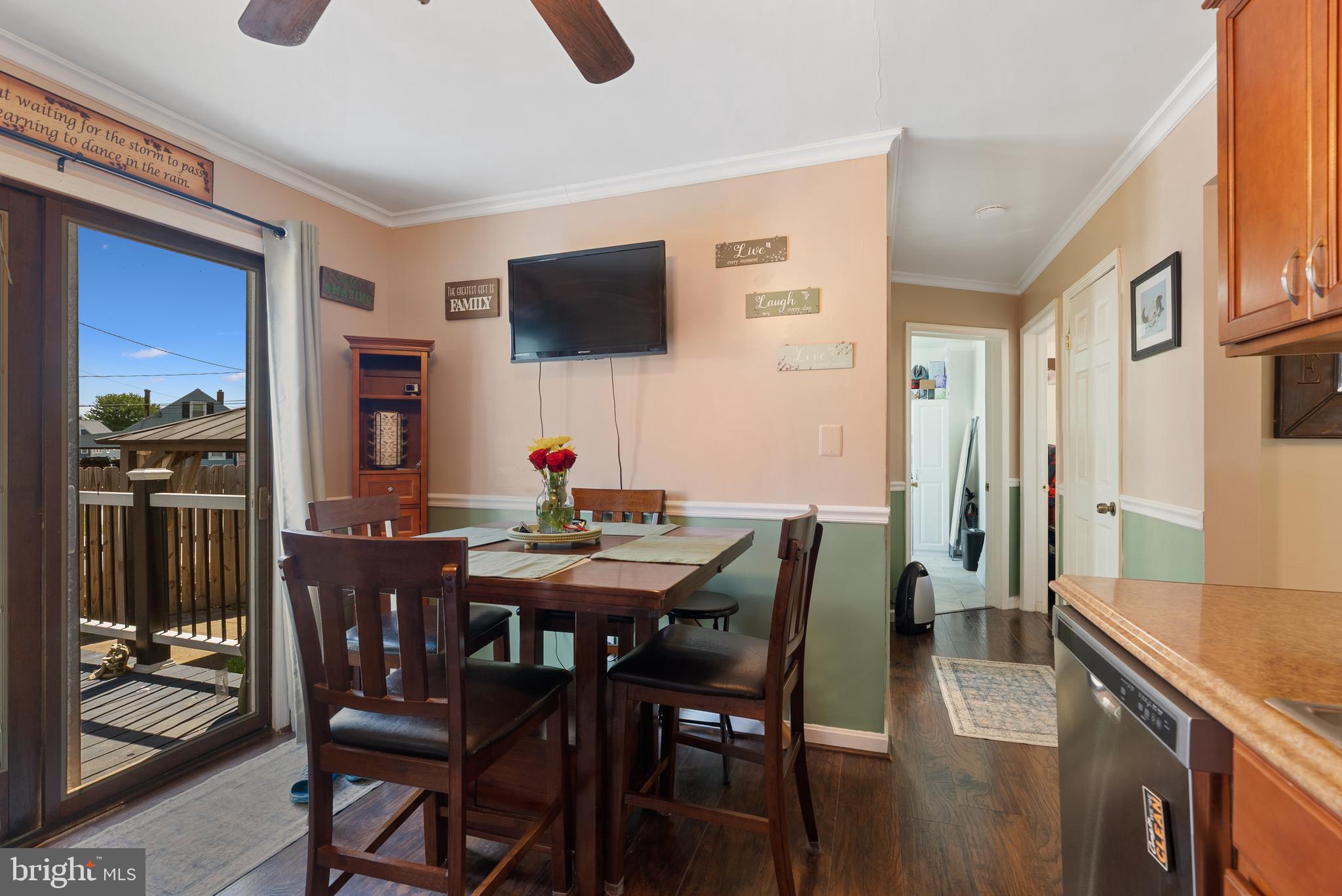 70 Del Rio Road Baltimore, MD 21222 - Photo 7 of 40 a view of a dining room with furniture and wooden floor