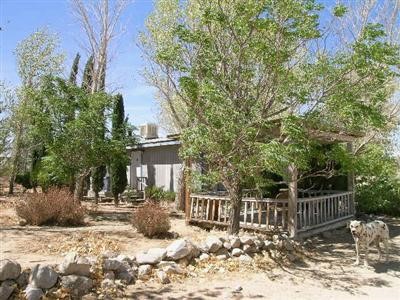 29490 Sutter Road Lucerne Valley, CA 92356 - Photo 1 of 1 a view of roof deck with wooden fence and floor