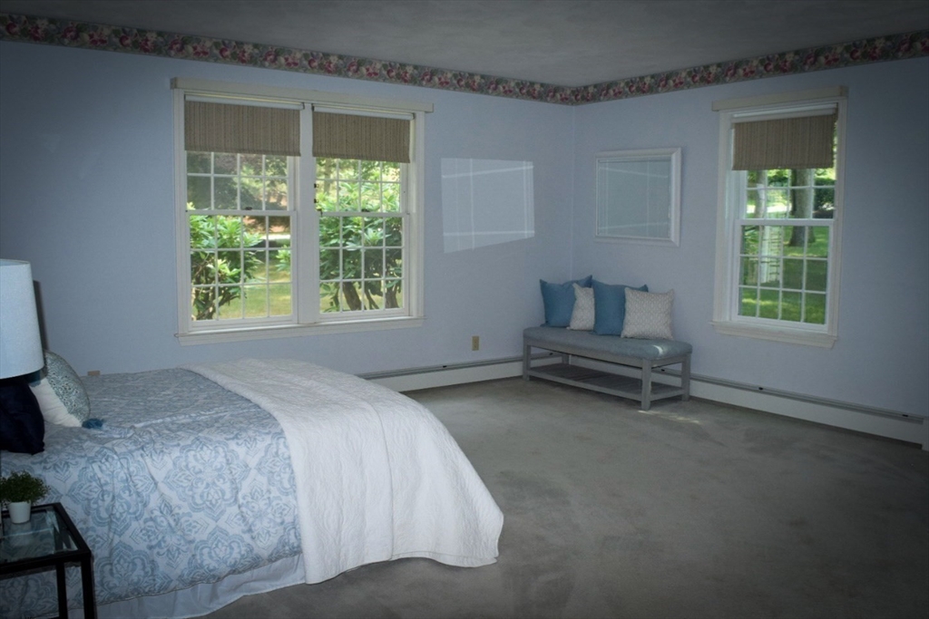 111 Bear Hill Road North Andover, MA 01845 - Photo 16 of 41 a bedroom with a bed and a window