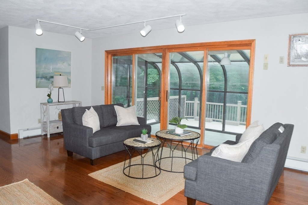 111 Bear Hill Road North Andover, MA 01845 - Photo 22 of 41 a living room with furniture and a large window