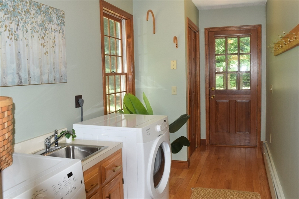 111 Bear Hill Road North Andover, MA 01845 - Photo 25 of 41 a room with a sink and a washer dryer