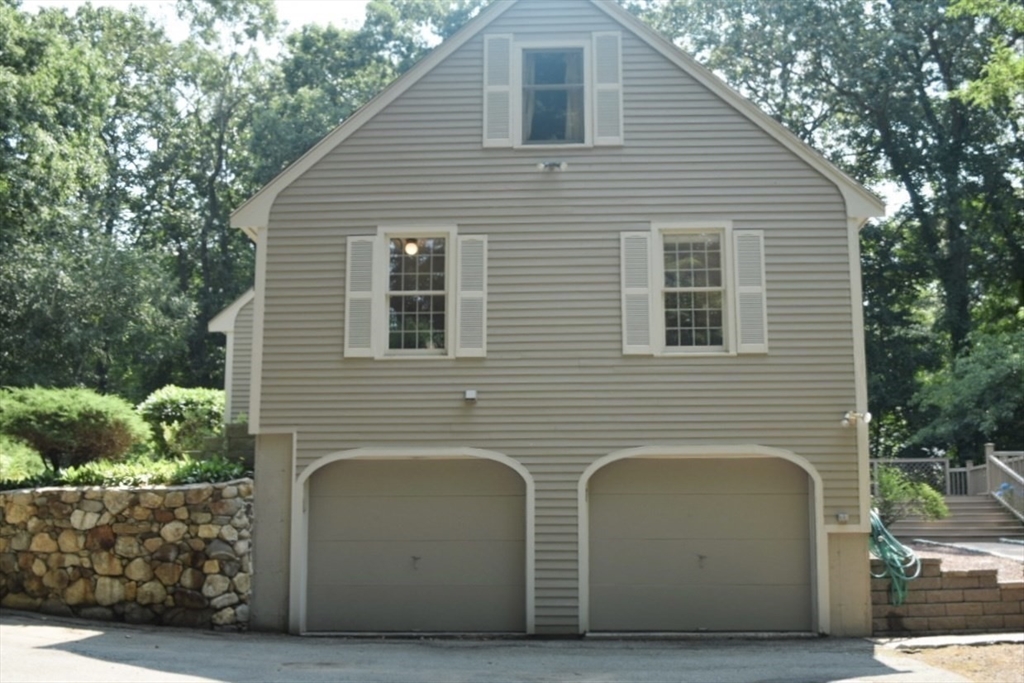 111 Bear Hill Road North Andover, MA 01845 - Photo 38 of 41 a front view of a house with garage
