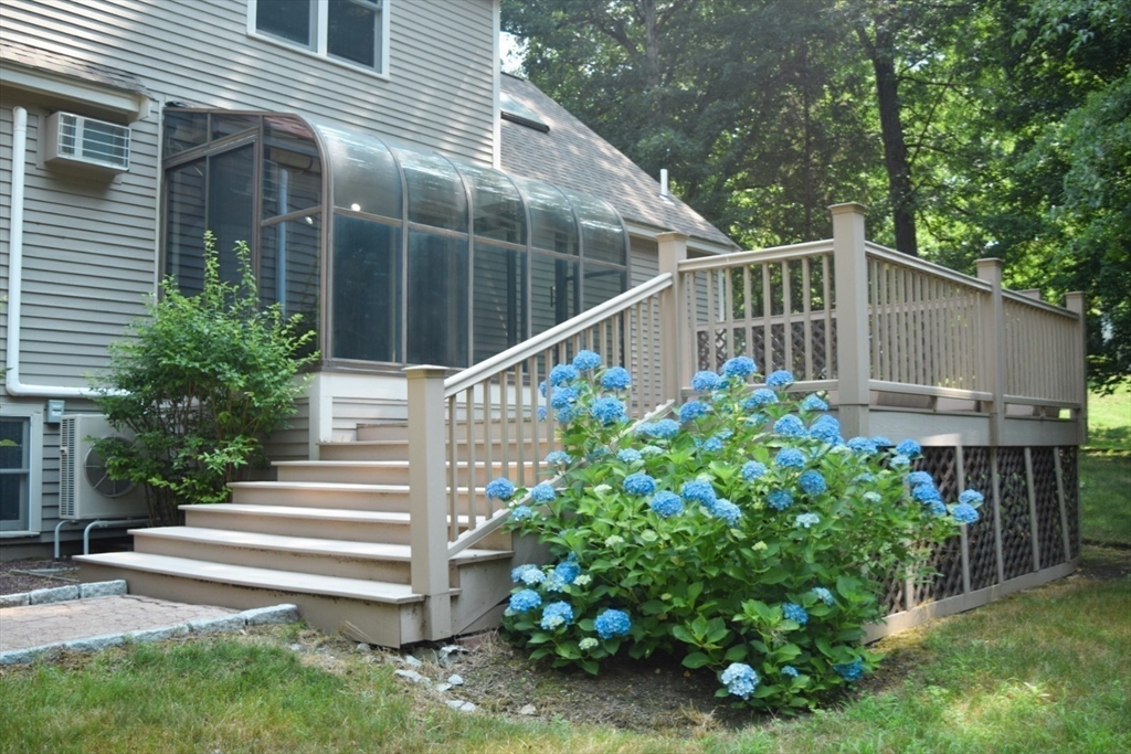 111 Bear Hill Road North Andover, MA 01845 - Photo 40 of 41 a view of a house with a flower garden