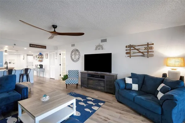 a view of a room with a large window