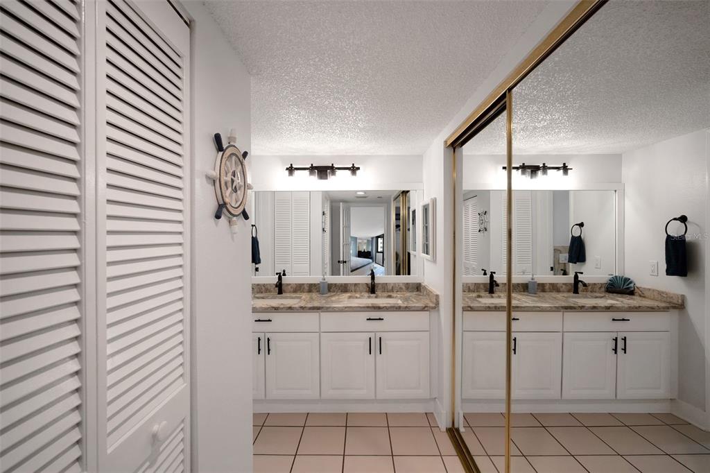 6035 Sea Ranch Drive, Unit 215 Hudson, FL 34667 - Photo 19 of 76 a kitchen with a white cabinets and sink