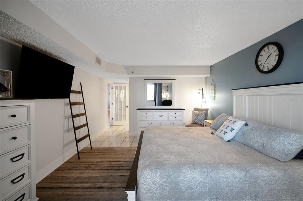 6035 Sea Ranch Drive, Unit 215 Hudson, FL 34667 - Photo 22 of 76 a living room with furniture and a flat screen tv