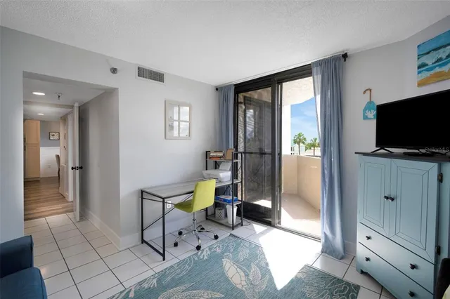 a view of a room with window and lake view