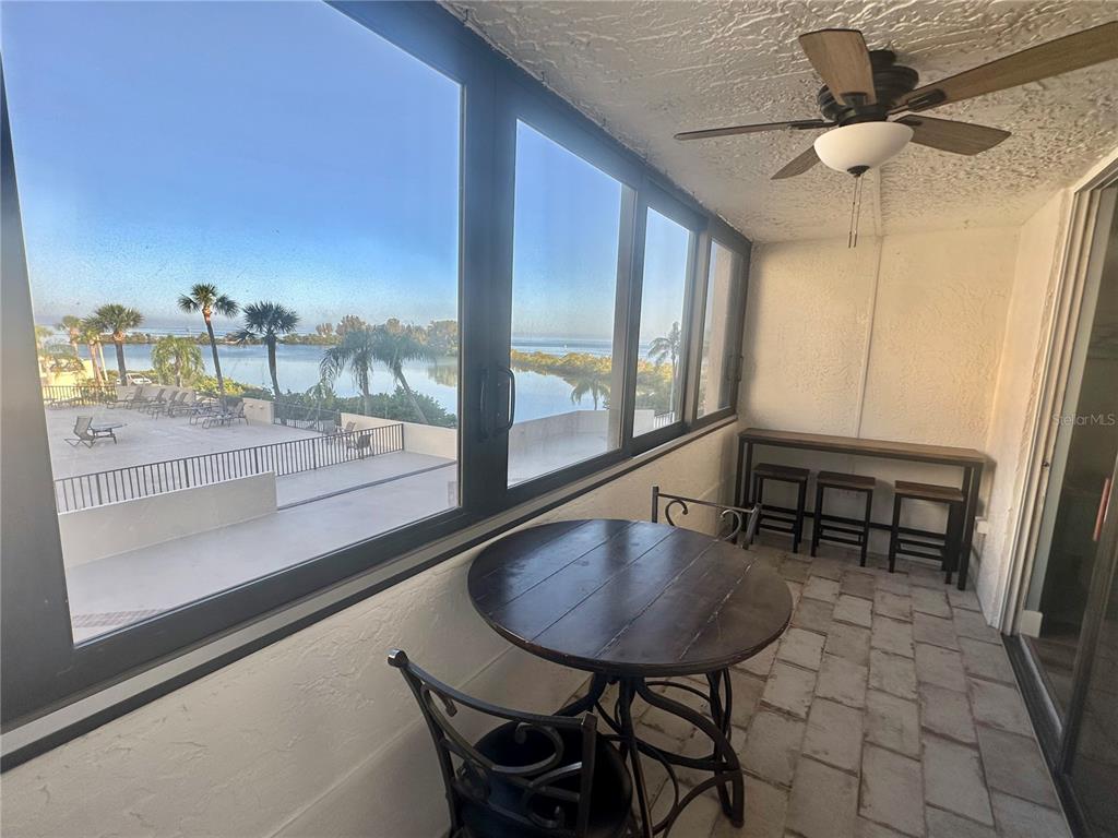 6035 Sea Ranch Drive, Unit 215 Hudson, FL 34667 - Photo 3 of 76 a very nice looking dining room with a table and chairs
