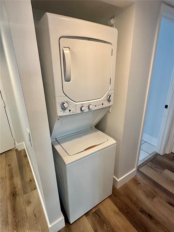 6035 Sea Ranch Drive, Unit 215 Hudson, FL 34667 - Photo 34 of 76 a utility room with dryer and washer