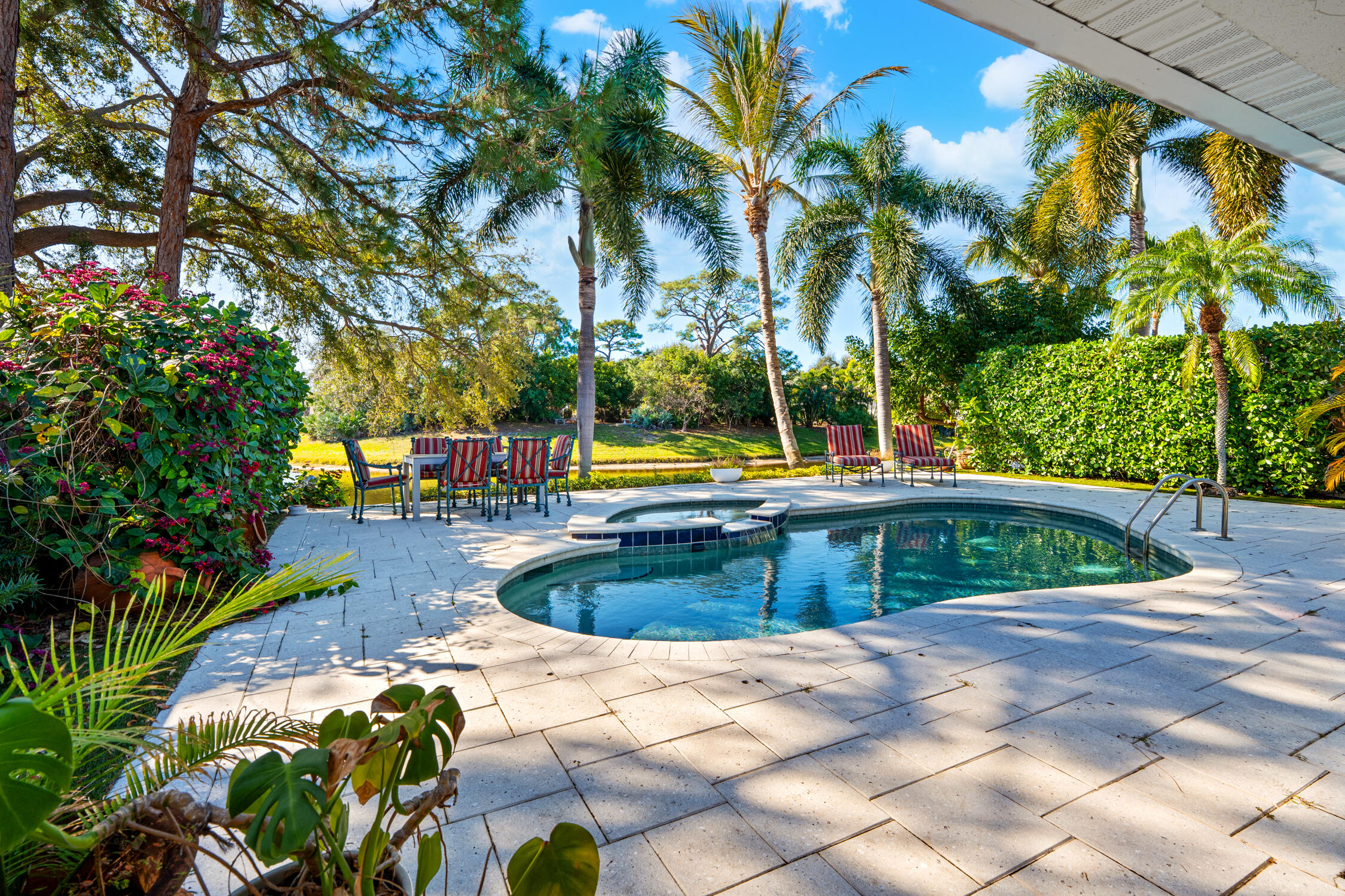 1084 Anchor Point Delray Beach, FL 33444 - Photo 17 of 25 a view of a swimming pool with a patio