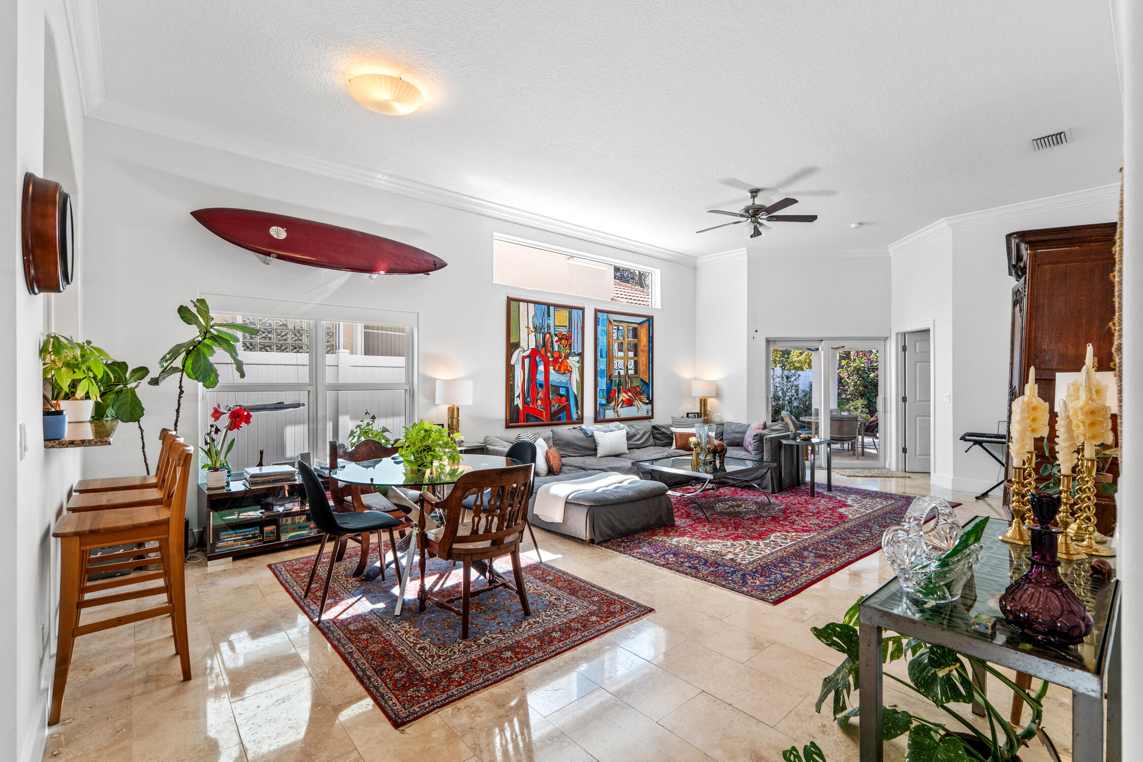 1084 Anchor Point Delray Beach, FL 33444 - Photo 6 of 25 a living room with patio furniture and a potted plant
